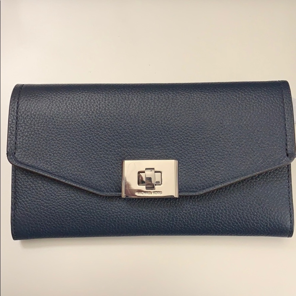 Excellent Used condition Michael Kors Cassie Wallet in Navy. $75